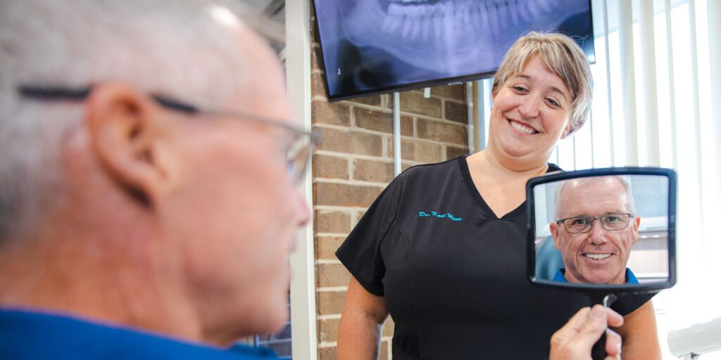 joe with dr mann after dental procedure